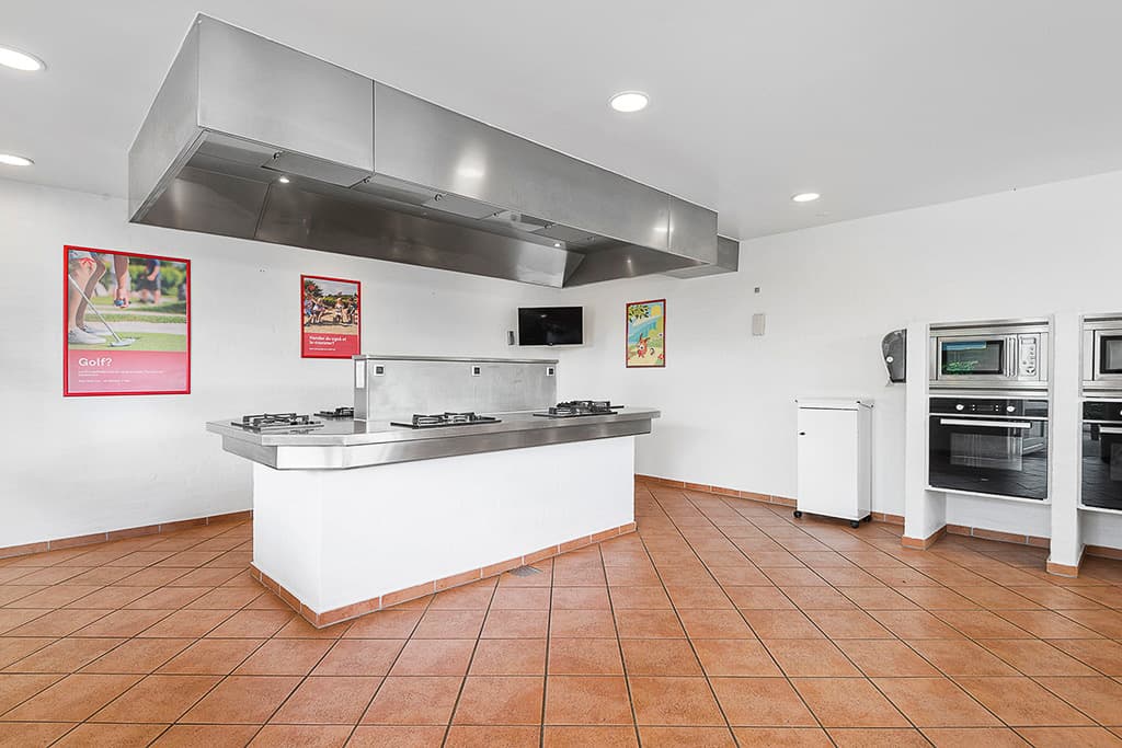 Service building at First Camp Frigård featuring laundry facilities and baby room