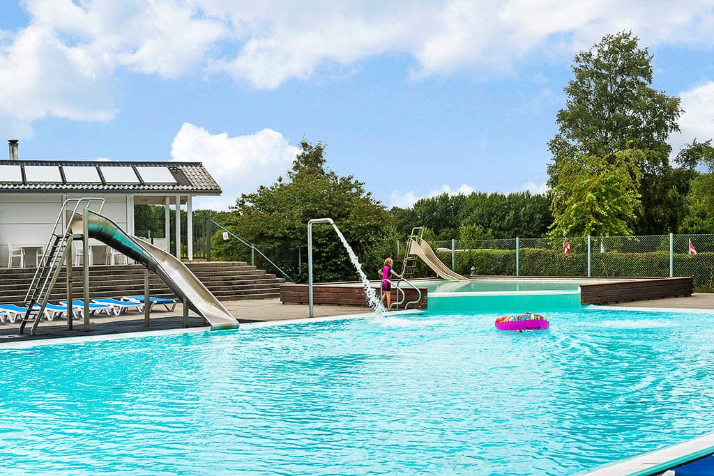 Caravans placed on seasonal pitches at First Camp Frigård near Flensburg Fjord