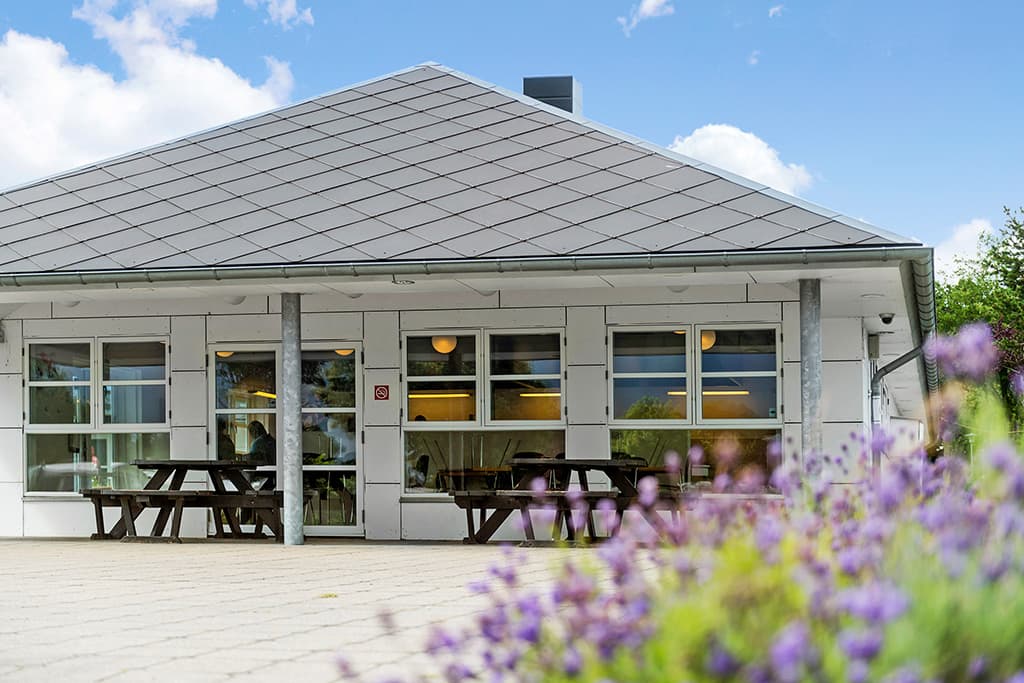 Modern service building at First Camp Frigård with toilets, showers and kitchen facilities
