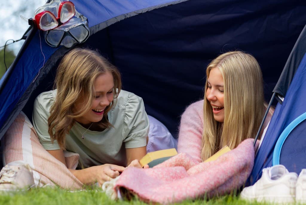 Tent pitches with electricity at a campsite in Bogense