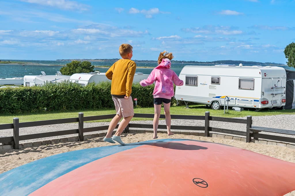 Caravan on a season pitch at Bøjden Strand