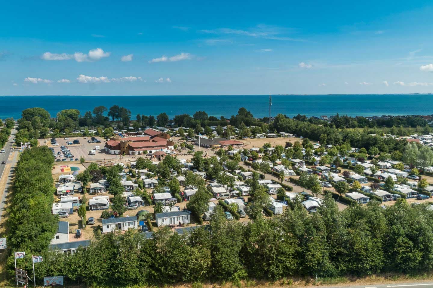 Caravans and motorhomes on spacious pitches at First Camp Hasmark Strand