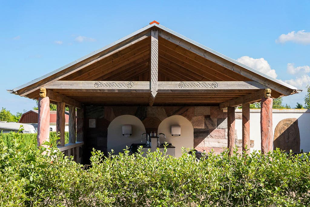 Modern service building with showers and toilets at Hasmark Strand