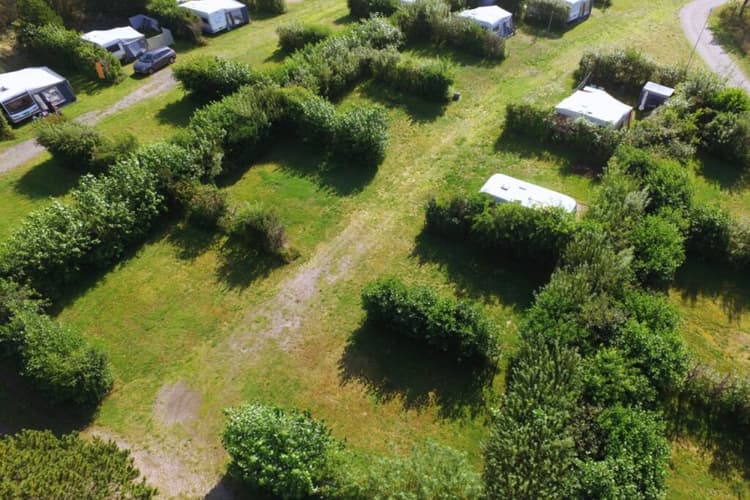 Caravans on seasonal pitches at a campsite in Skagen