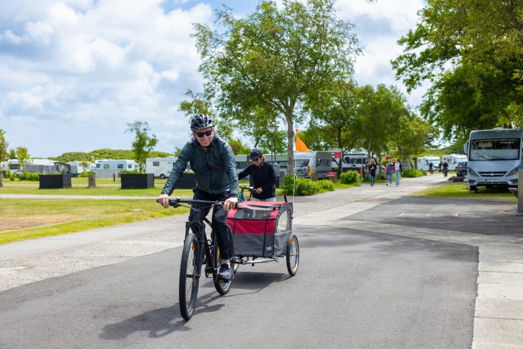 Seasonal camping pitches at First Camp Grenen Strand with caravans set up for long stays